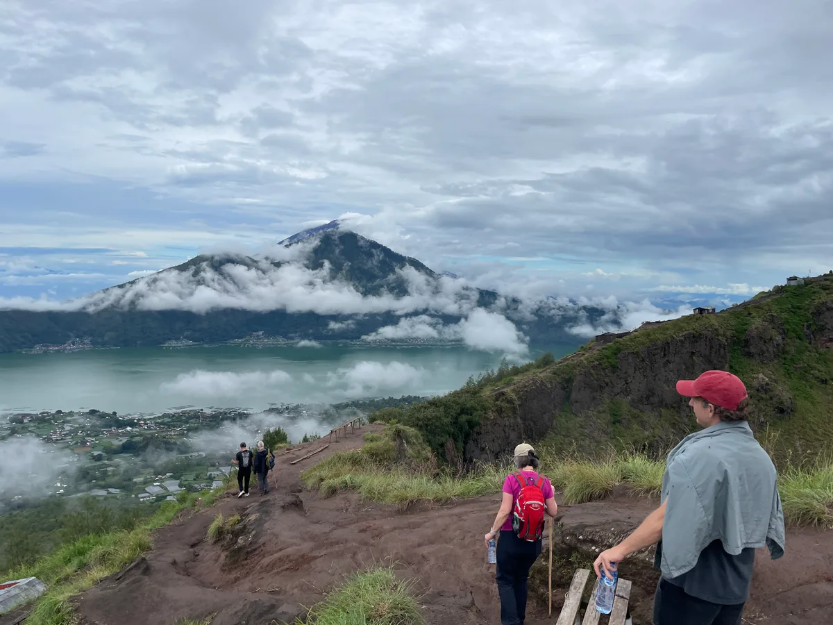 Visitors walking above the lake in Kintamani, Bali