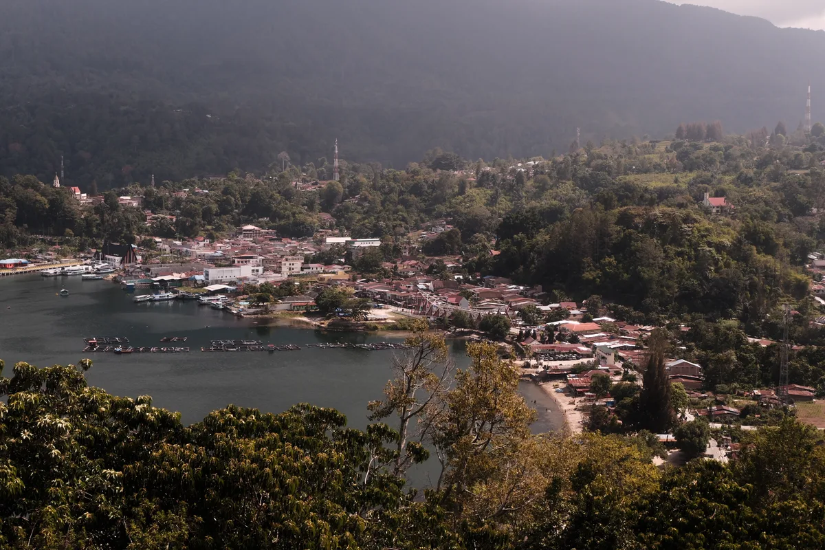 Lakeside town and hills at Lake Toba, North Sumatra